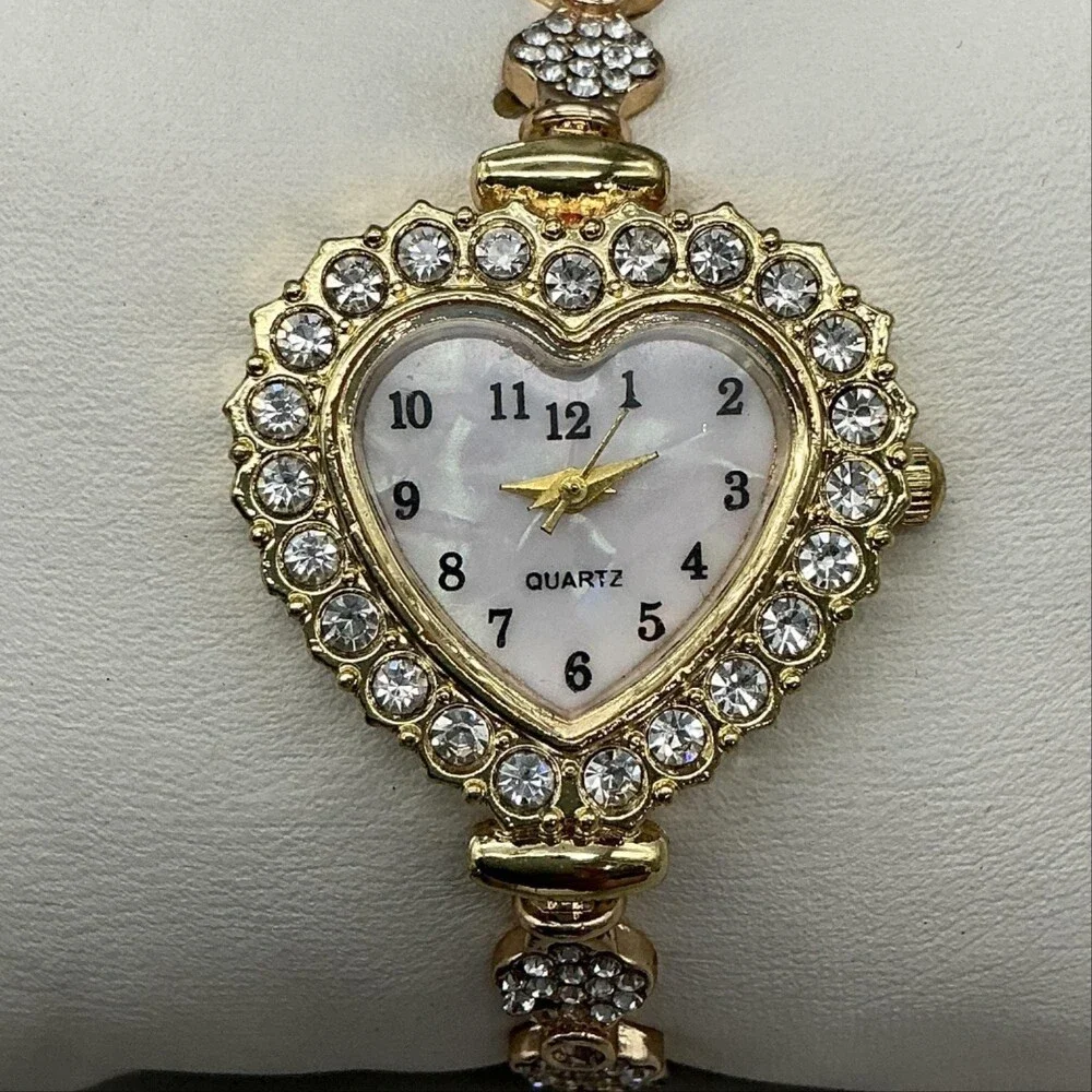 MOP Dial Womens Watch 28mm Gold Tone Heart Crystal Bolo Adjustable Bracelet